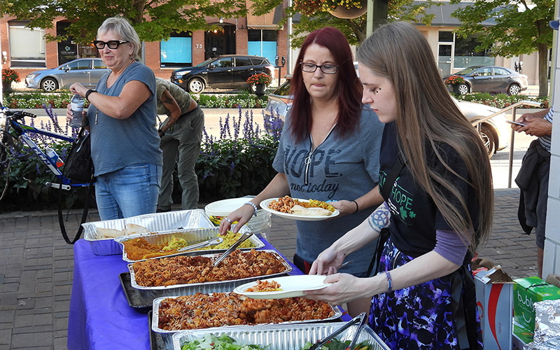 A community meal where supporters broke bread with the homeless.