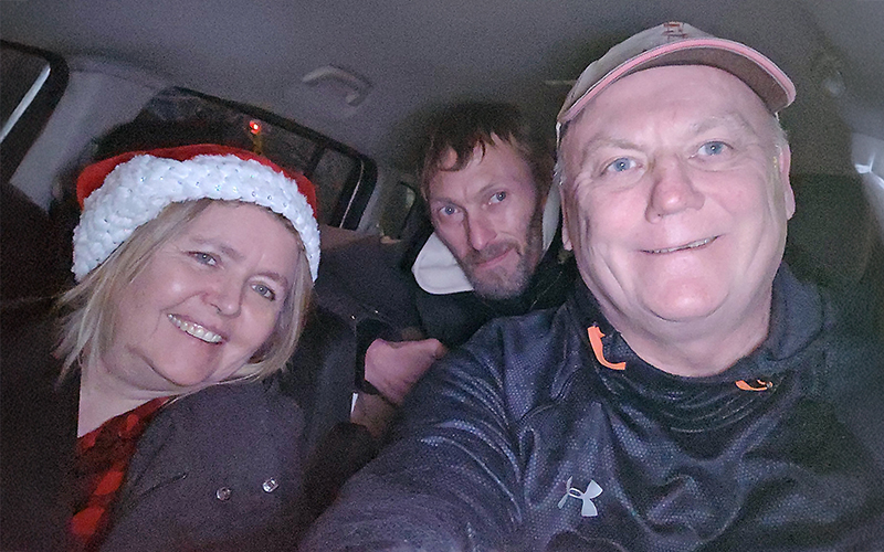 Christine W--- N-----, Jay C---, and John Ironside on the road delivering Christmas cheer.